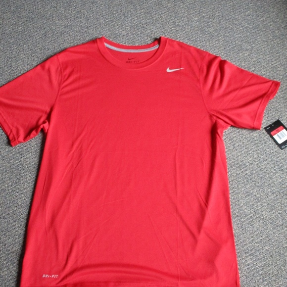 orange and olive green nike shirt